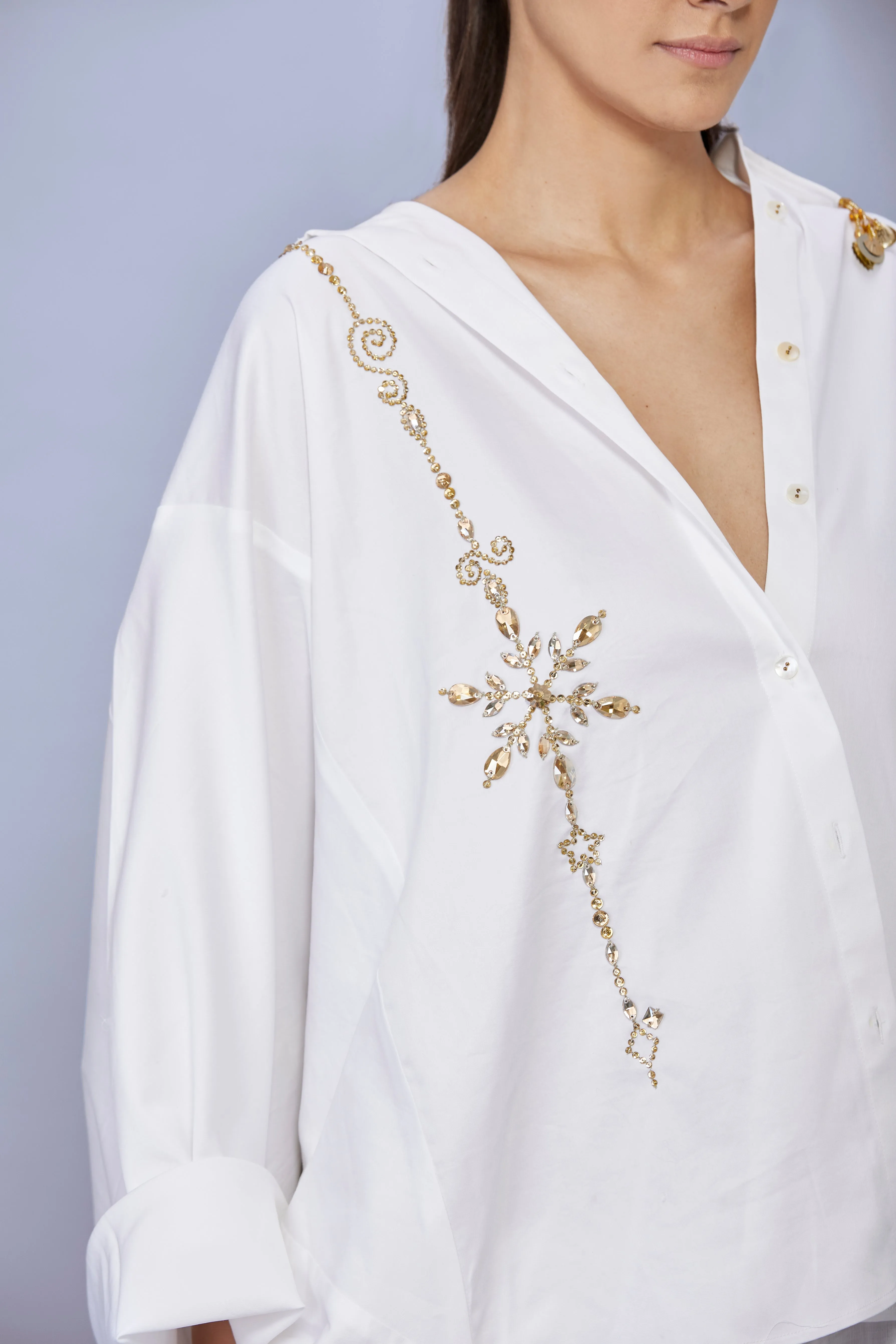 White cotton batwing shirt with gold diamonds snowflakes embroidery